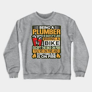 Being a plumber is easy it is like riding a bike except the bike is on fire Crewneck Sweatshirt